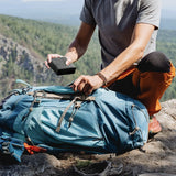 Powerpad Pro gray in backpack while camping