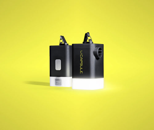 U Capsule in black and yellow